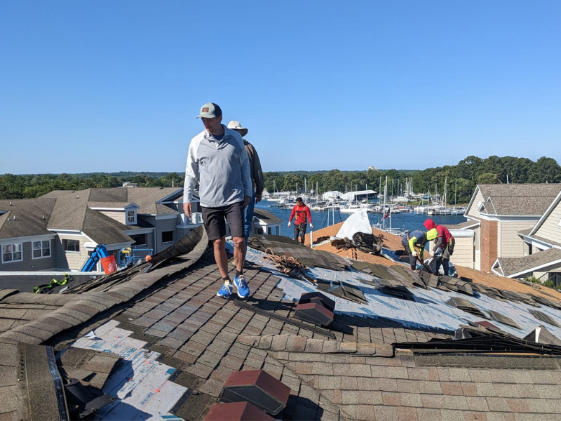 Matt inspecting roof